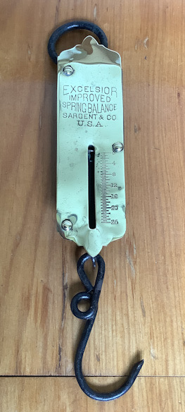Old polished brass fronted United States made scales